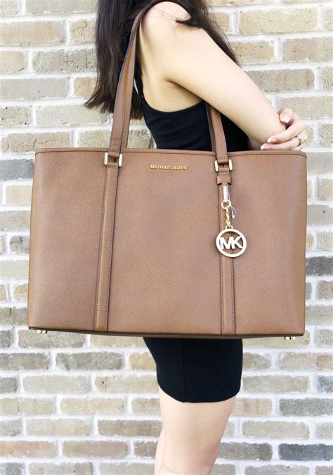 michael kors laptop bag tote|michael kors laptop bag outlet.